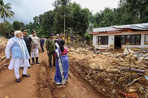 Narendra Modi inspects the landslide-affected Wayanad